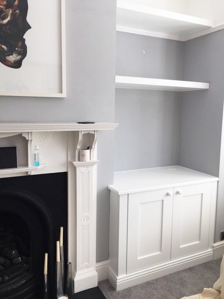 fitted white alcove cupboard and shelf